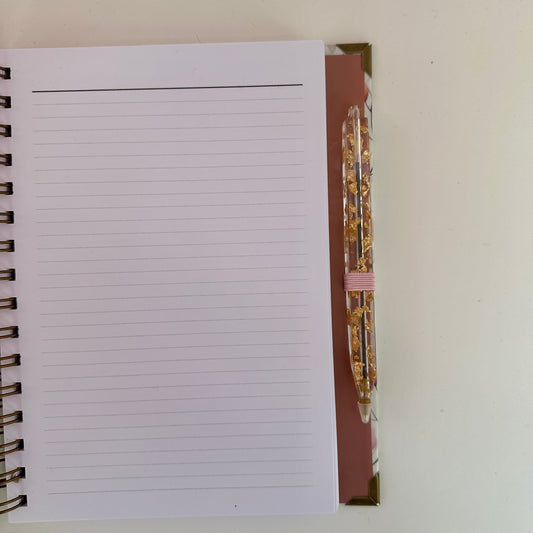 Caderno + Caneta