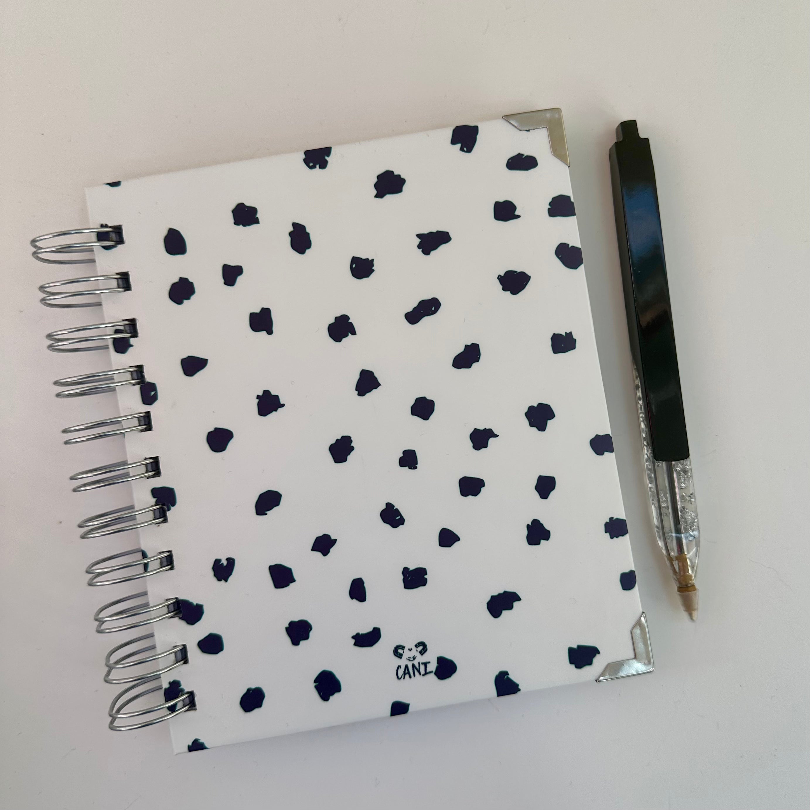 Caderno + Caneta