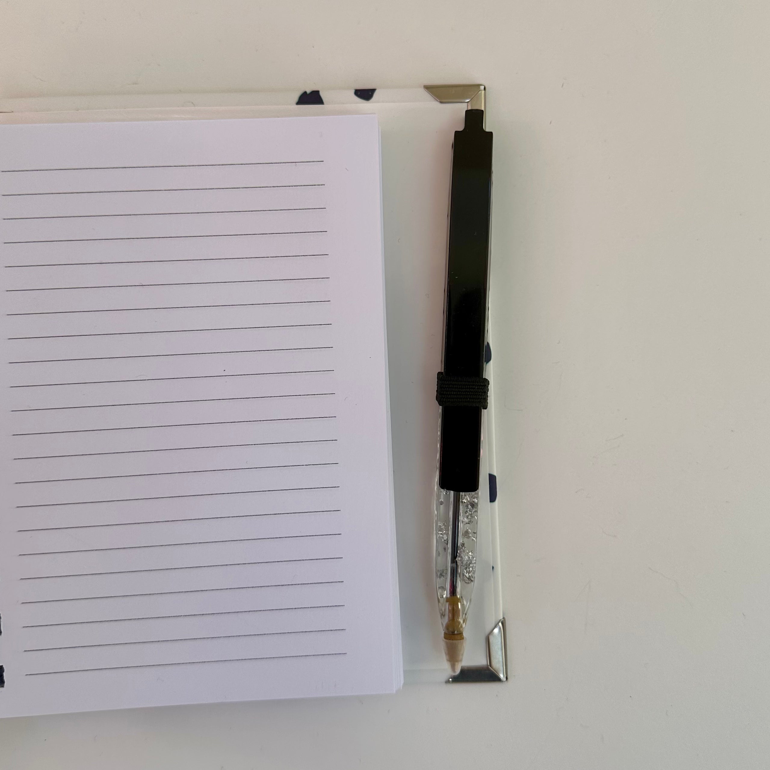 Caderno + Caneta