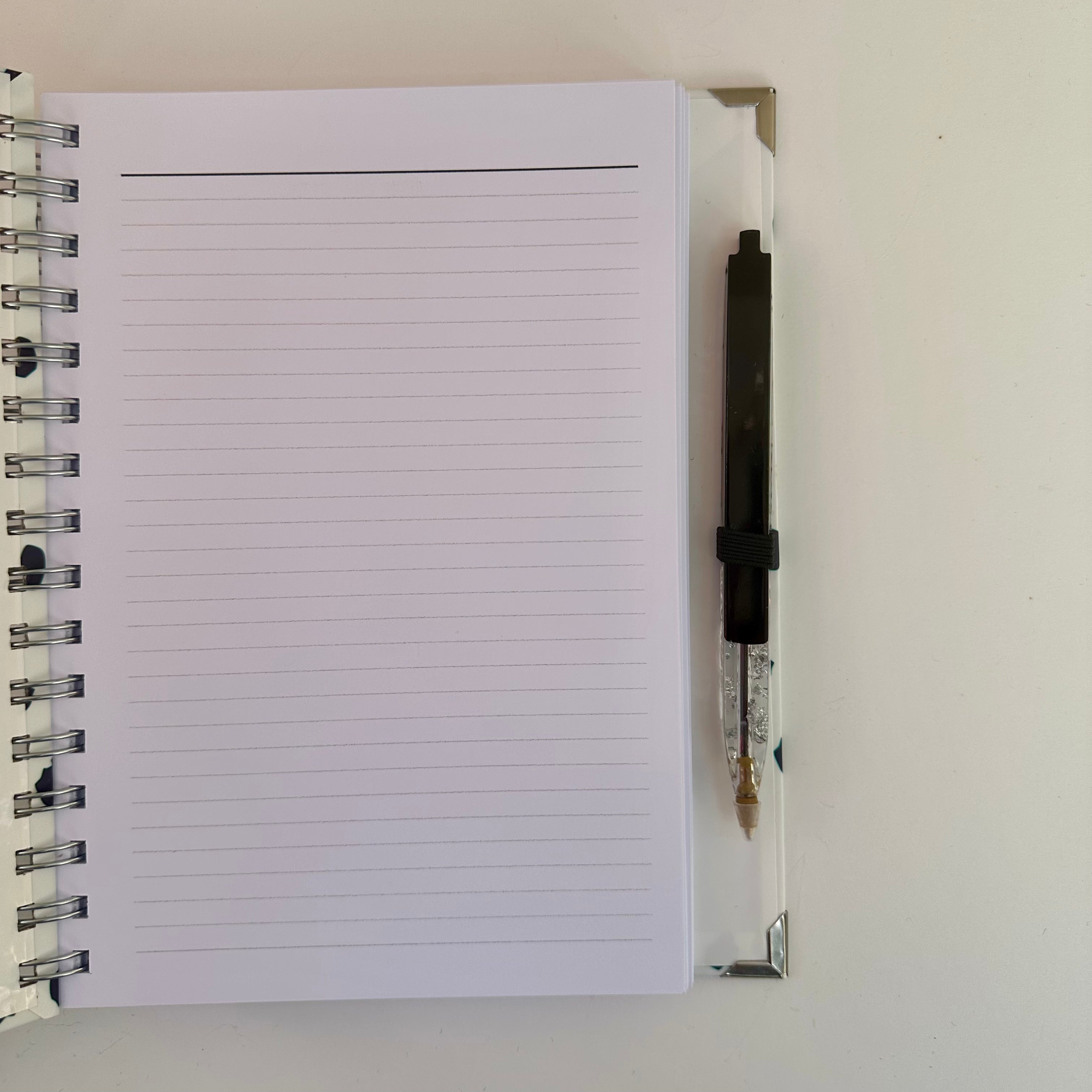 Caderno + Caneta