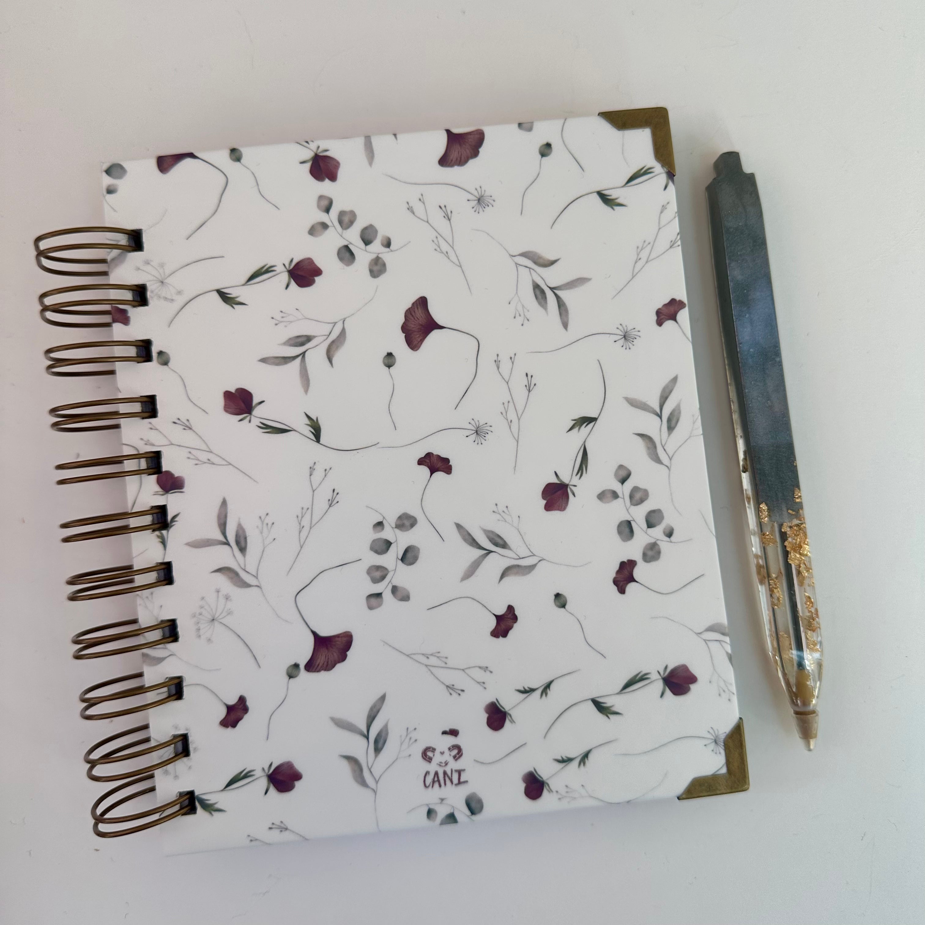 Caderno + Caneta