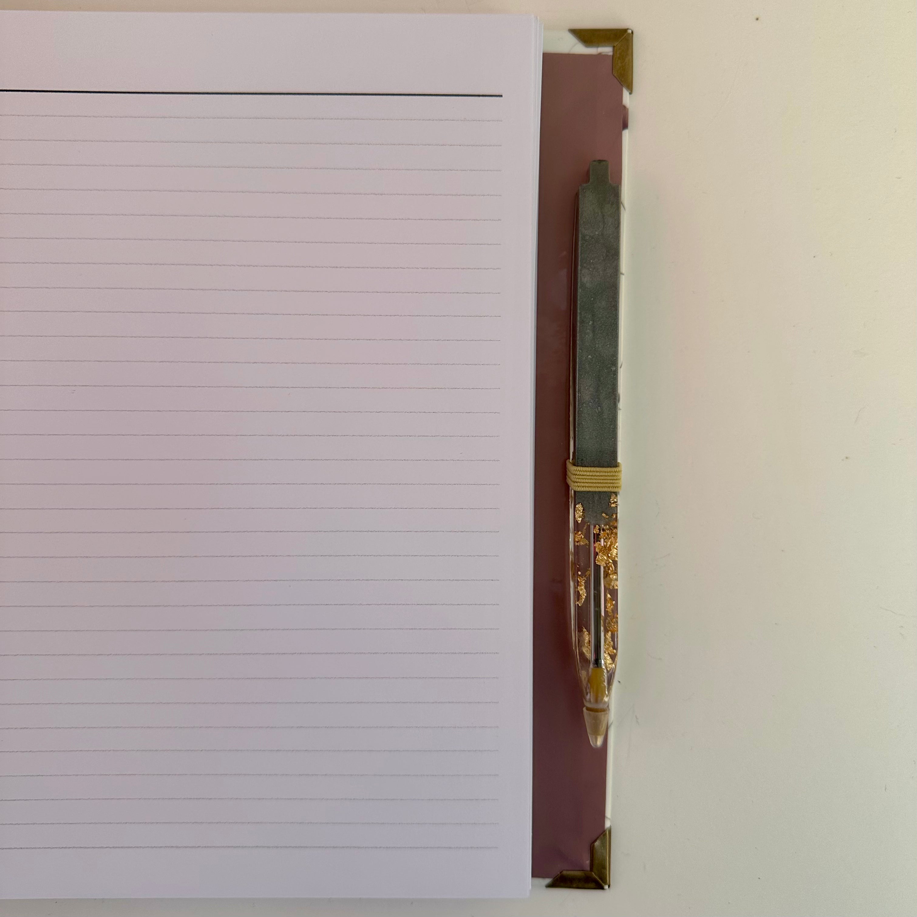 Caderno + Caneta