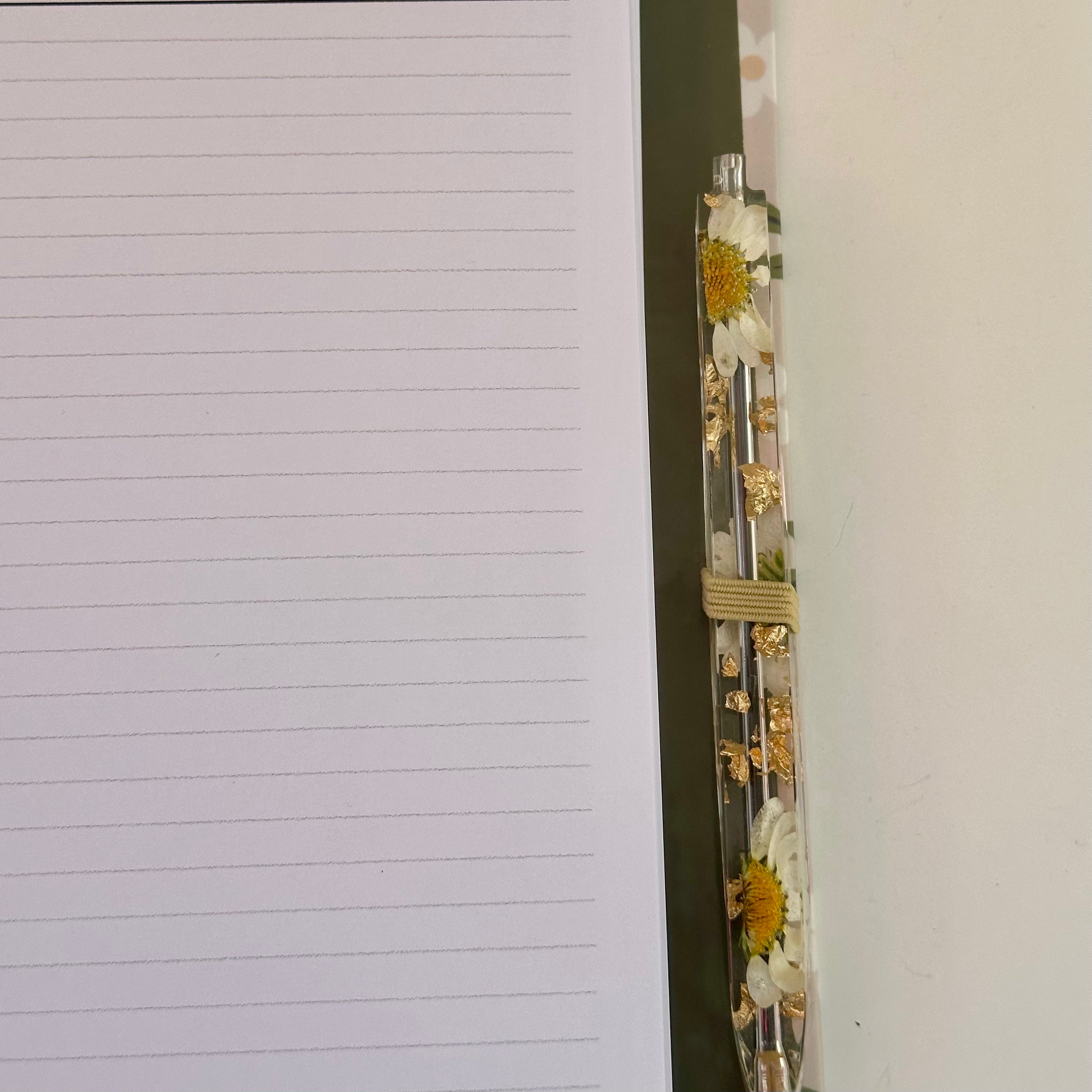 Caderno + Caneta